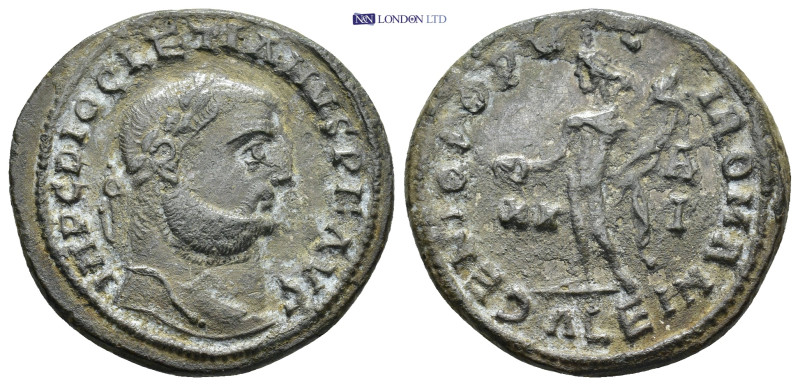 Diocletian, 284-305. Follis. Alexandria. (9.24 Gr. 27mm.)
Laureate head right 
R...