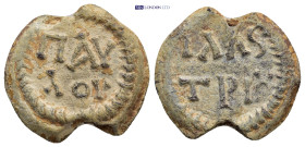 Byzantine Lead Seal (22mm, 7.6 gr) Obv: Legends in two lines. Rev: Legends in two lines.