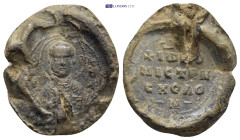 Byzantine Lead Seal (25mm, 12.8 gr) Obv: Bust of Saint holding gospel. Rev: Legends in four lines.