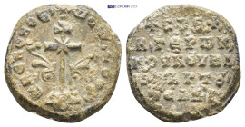 Byzantine Lead Seal (18mm, 4.88 gr) Obv: Large patriarchal cross on steps, with floral ornaments springing from the base and X's at the intersections;...
