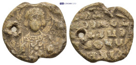 Byzantine Lead Seal (20mm, 5.9 gr) Obv: Bust of St. Theodore holding a spear and shield. Rev: Legend five lines.