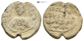 Byzantine Lead Seal (21mm, 6.95 gr) Obv: Facing bust of the Virgin Mary, orans, with medallion of Christ on chest Rev: Legend five lines.
