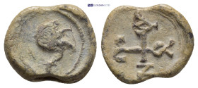 Byzantine Lead Seal (14mm, 3.7 gr) Obv: Ostrich or camel advancing left. Rev: Cruciform monogram.