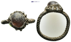 A silver ring with red stone. (15mm, 3.51 g)