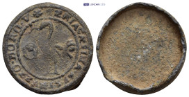 Lead cap of a medicine bottle. (25mm, 9.1 g) Ostrich left, basket with child in beak.