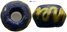 A square-section wound glass bead with facetted edges to top and bottom. (39mm, 39.66 g)