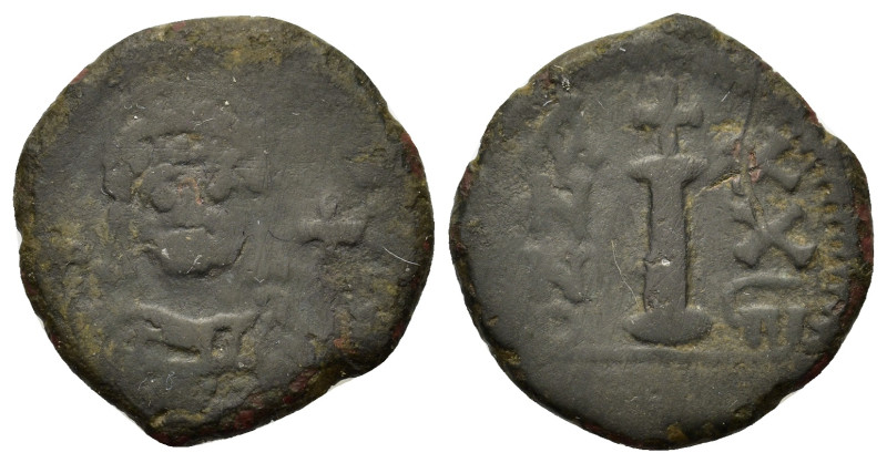 Justinian I (527-565). Æ 10 Nummi (20mm, 4.66g). Antioch, year 28. Helmeted, and...