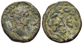 Elagabalus (218-222). Syria, Seleucis and Pieria. Antioch. Æ (21,5mm, 7.4g). Laureate head right. R/ Large ΔE, star beneath, all within laurel wreath ...