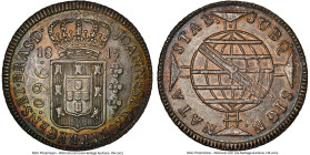 João Prince Regent 960 Reis 1815-B MS63 NGC, Bahia mint, KM307.1, LMB-400. Struck on a Charles IV 8 Reales 1789 LM-IJ. An eye-catching rainbow of pati...