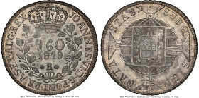 João VI 960 Reis 1819-R MS63+ NGC, Rio de Janeiro mint, KM326.1, LMB-477. Overstruck on a Chile "Volcano" Peso 1817 So-FJ. With clear ID features from...