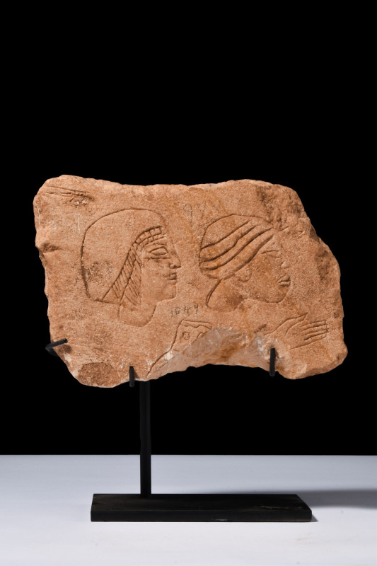 EGYPTIAN LIMESTONE GRAFFITO WITH TWO HEADS

 Egypt, New Kingdom, late 18th-ear...