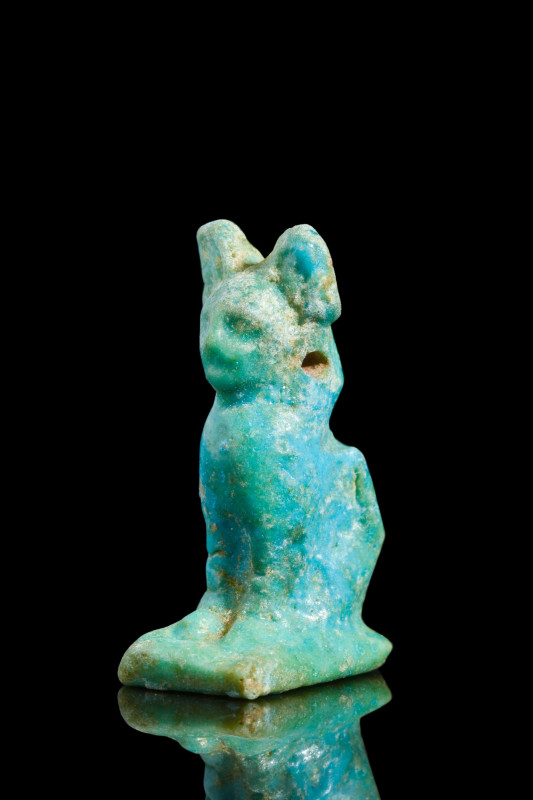 EGYPTIAN FAIENCE AMULET OF BASTET

 Late Period/Ptolemaic, Ca. 712-30 BC
 A f...