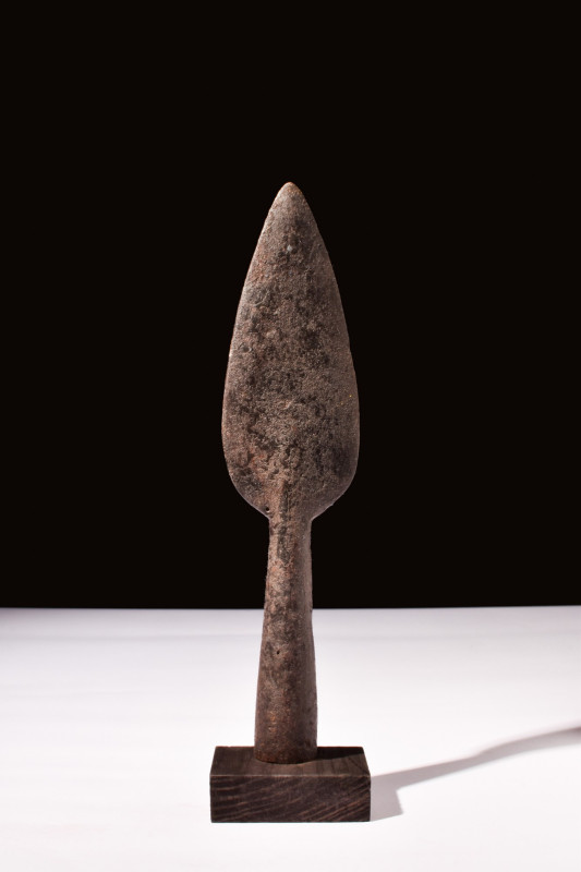 A ROMAN IRON SPEAR HEAD

 Ca. 100-300 AD
 A Roman socketed iron spearhead wit...