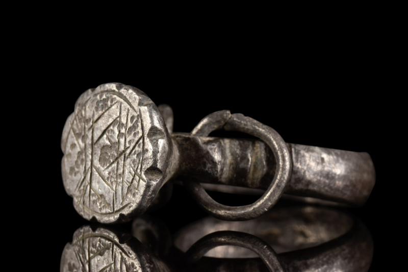 BYZANTINE SILVER RING

 Ca. 800 AD
 A silver ring that has an elegant design ...