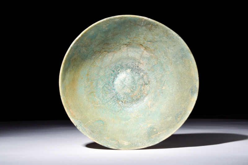 KASHAN TURQUOISE POTTERY BOWL

 Ca. 1100-1200 AD
 A pottery bowl with a trunc...