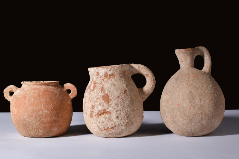 HOLY LANDS BRONZE AGE GROUP OF THREE TERRACOTTA VESSELS

 Ca. 2000-1000 BC
 A...