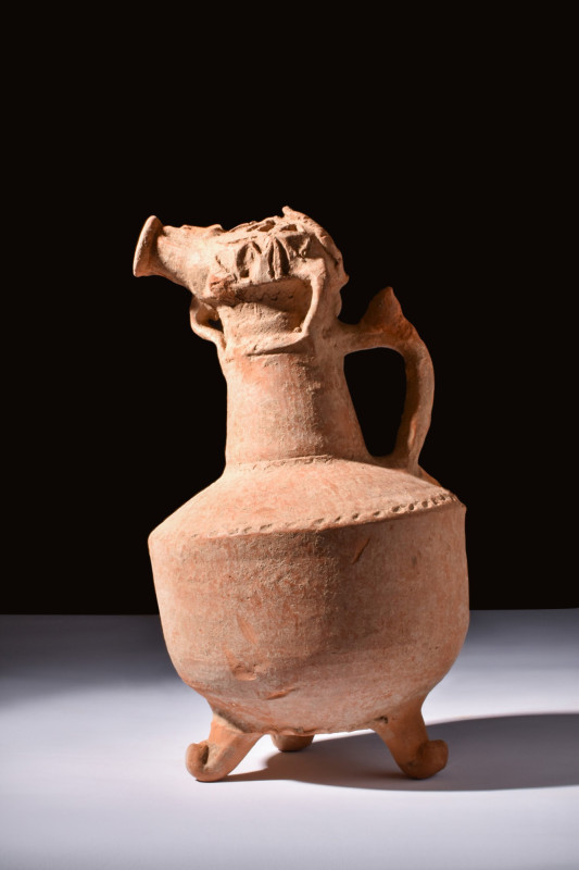 ANCIENT IRANIAN POTTERY JUG

 Ca. 1000 BC
 A pottery jug decorated with dark-...