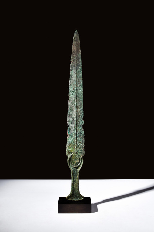 ANCIENT BRONZE SWORD

 Western Asiatic/Aegan, ca. 1200-700 BC
 A bronze sword...