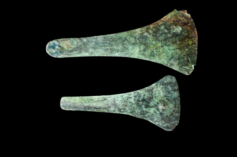 BRONZE AGE PAIR OF FLAT AXE HEADS

 Ca. 2000 BC
 A set of two bronze axe head...