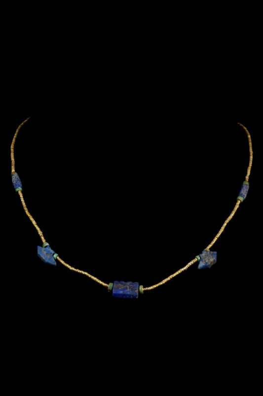 BACTRIAN GOLD AND LAPIS BEADED NECKLACE

 Ca. 2000-1000 BC
 A restrung neckla...