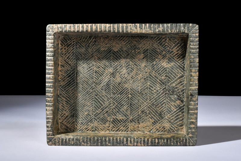 BACTRIAN STONE OFFERING TABLE 

 Ca. 2000-1000 BC
 A rectangular table with f...