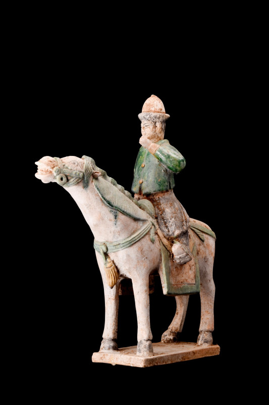 CHINESE MING DYNASTY GLAZED TERRACOTTA HORSE WITH A RIDER

 Ca. 1368-1644 AD
...