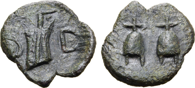 Sicily, Tyndaris Æ 19mm. After 241 BC. Pilei of Dioskouroi surmounted by stars /...