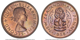 Elizabeth II Proof 1/2 Penny 1958 PR63 Red and Brown PCGS, KM23.2. A rainbow of toning is discovered in the light. HID09801242017 © 2023 Heritage Auct...