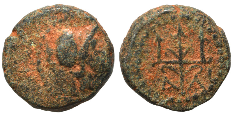 Greek. Ae (bronze, 1.29 g, 10 mm). Helmeted head of Athena right. Rev. Trident; ...