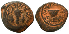 JUDAEA. First Jewish War, 66-70. 1/8 Shekel (bronze, 4.73 g, 20 mm), Jerusalem. Omer cup. Rev. Lulav bunch flanked by etrogs. Meshorer 214; Hendin 639...
