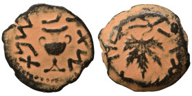 JUDAEA. First Jewish War, 66-70 AD. Prutah (bronze, 3.15 g, 18 mm). Amphora. Rev. Vine leaf on branch with tendril. Hendin 1360; Meshorer 196. Nearly ...