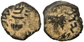 JUDAEA. First Jewish War, 66-70 AD. Prutah (bronze, 2.15 g, 16 mm). Amphora. Rev. Vine leaf on branch with tendril. Hendin 1360; Meshorer 196. Nearly ...