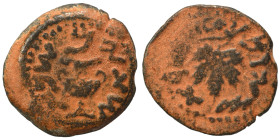 JUDAEA. First Jewish War, 66-70 AD. Prutah (bronze, 3.25 g, 18 mm). Amphora. Rev. Vine leaf on branch with tendril. Hendin 1360; Meshorer 196. Nearly ...