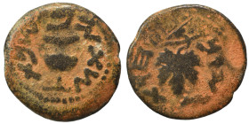JUDAEA. First Jewish War, 66-70 AD. Prutah (bronze, 2.99 g, 18 mm). Amphora. Rev. Vine leaf on branch with tendril. Hendin 1360; Meshorer 196. Nearly ...