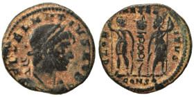 Dalmatius, 335-337. Follis (bronze, 1.81 g, 16 mm), Constantinople. FL DELMATIVS NOB C Laureate, draped, and cuirassed bust right. Rev. GLOR-IA EXERC-...