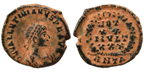 Valentinian II, 375-392. Ae (bronze, 1.37 g, 13 mm), Antioch. Pearl-diademed, draped and cuirassed bust right. Rev. VOT XX MVLT XXX in four lines with...