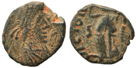 Uncertain, circa 5th centuries AD. Ae (bronze, 1.15 g, 11 mm). Diademed, draped, and cuirassed bust right. Rev. Victory advancing left, holding trophy...