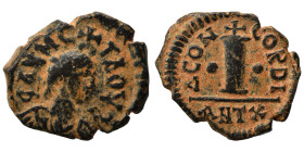 Anastasius I, 491-518. Decanummium (bronze, 4.53 g, 21 mm), Antioch. Blundered legend around, Diademed, draped and cuirassed bust right. Rev. ΔCONCORD...
