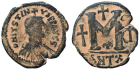 Justin I, 518-527. Follis (bronze, 16.12 g, 33 mm), Theoupolis (Antioch). D N IYSTINYS PP AYCS Diademed and draped bust of Justin I to right. Rev. Lar...