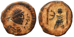 Justin I, 518-527. Pentanummium (bronze, 2.00 g, 14 mm), Theoupolis (Antioch). Diademed, draped and cuirassed bust of Justin I to right. Rev. Tyche of...