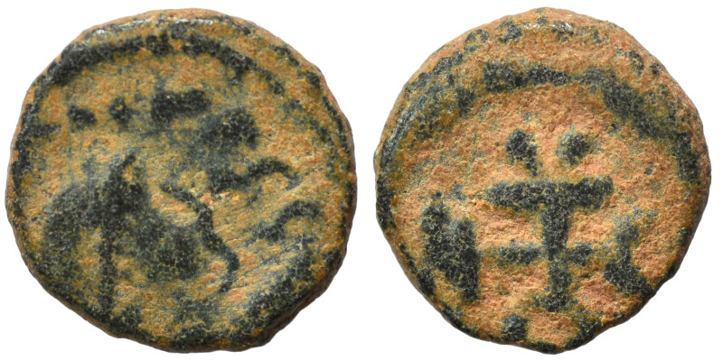 Justin I, 518-527. Pentanummium (bronze, 0.66 g, 8 mm), Theoupolis (Antioch). D ...