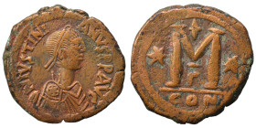 Justinian I, 527-565. Follis (bronze, 17.59 g, 33 mm), Constantinople. DN IVSTINIANVS P P AVG Diademed, draped and cuirassed bust right. Rev. Large M,...