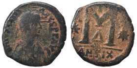 Justinian I, 527-565. Follis (bronze, 15.84 g, 31 mm), Theoupolis (Antioch). D N IVSTINIANVS P P AVG Diademed, draped, and cuirassed bust right. Rev. ...
