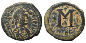 Justinian I, 527-565. Follis (bronze, 16.32 g, 30 mm), Nicomedia. D N IVSTINIANVS P AV [.. ]Draped and diademed bust right. Rev. Large M, star to left...