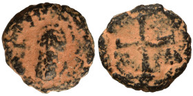 Justinian I, 527-565. Nummus (bronze, 0.89 g, 9 mm), Carthage. Facing bust, holding cross in right hand. Rev. Helmeted and draped bust facing. Rev. Mo...