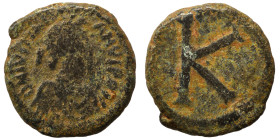 Justinian I, 527-565. Half Follis (bronze, 3.49 g, 16 mm). Salona. Diademed, draped, and cuirassed bust right. Rev. Large K. DOC 360; MIBE 250; SB 331...