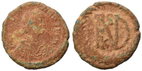 Justinian I, 527-565. Half Follis (bronze, 5.13 g, 20 mm), Ravenna. Diademed, draped, and cuirassed bust right. Rev. Large monogram of Justinian; K be...