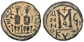 Justin II, with Sophia, 565-578. Follis (bronze, 11.42 g, 29 mm), Eastern imitation. Justin, holding globus cruciger, and Sophia, holding cruciform sc...