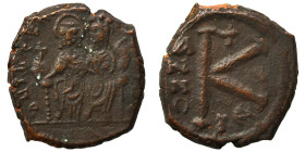 Tiberius II Constantine, with Anastasia. 578-582. Half Follis(bronze, 6.09 g, 20 mm), Thessalonica. Tiberius II and Anastasia seated facing on double ...