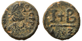 Maurice Tiberius, 582-602. 12 Nummi (bronze, 4.90 g, 16 mm), Alexandria. […] IC P P Diademed, draped and cuirassed bust right, holding cross. Rev. Cro...